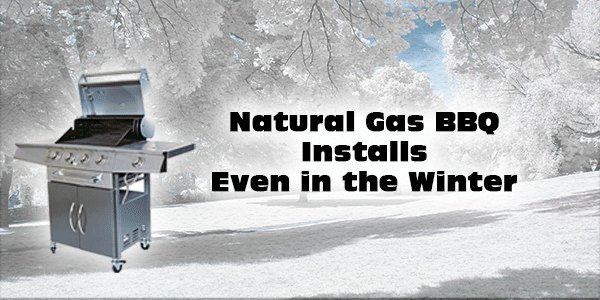 Natural gas barbecue on a snowy deck